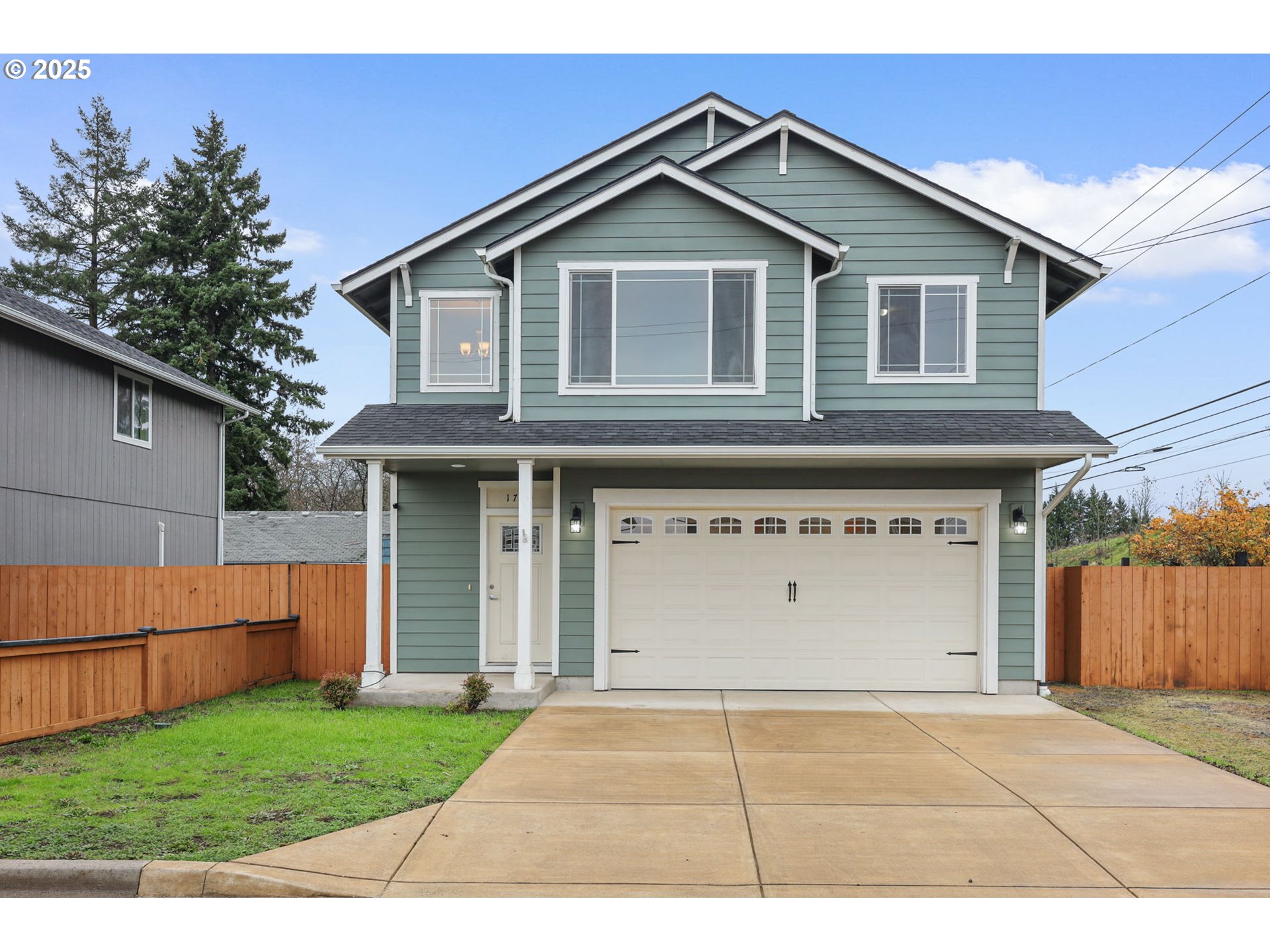 1725 Allea Drive Eugene, OR 97404 - Photo 1 of 44 a front view of a house with garage