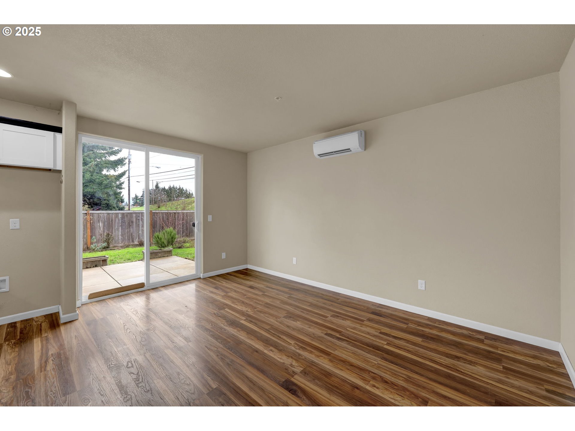 1725 Allea Drive Eugene, OR 97404 - Photo 15 of 44 a view of an empty room and wooden floor