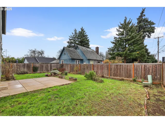 a view of a backyard with a slide