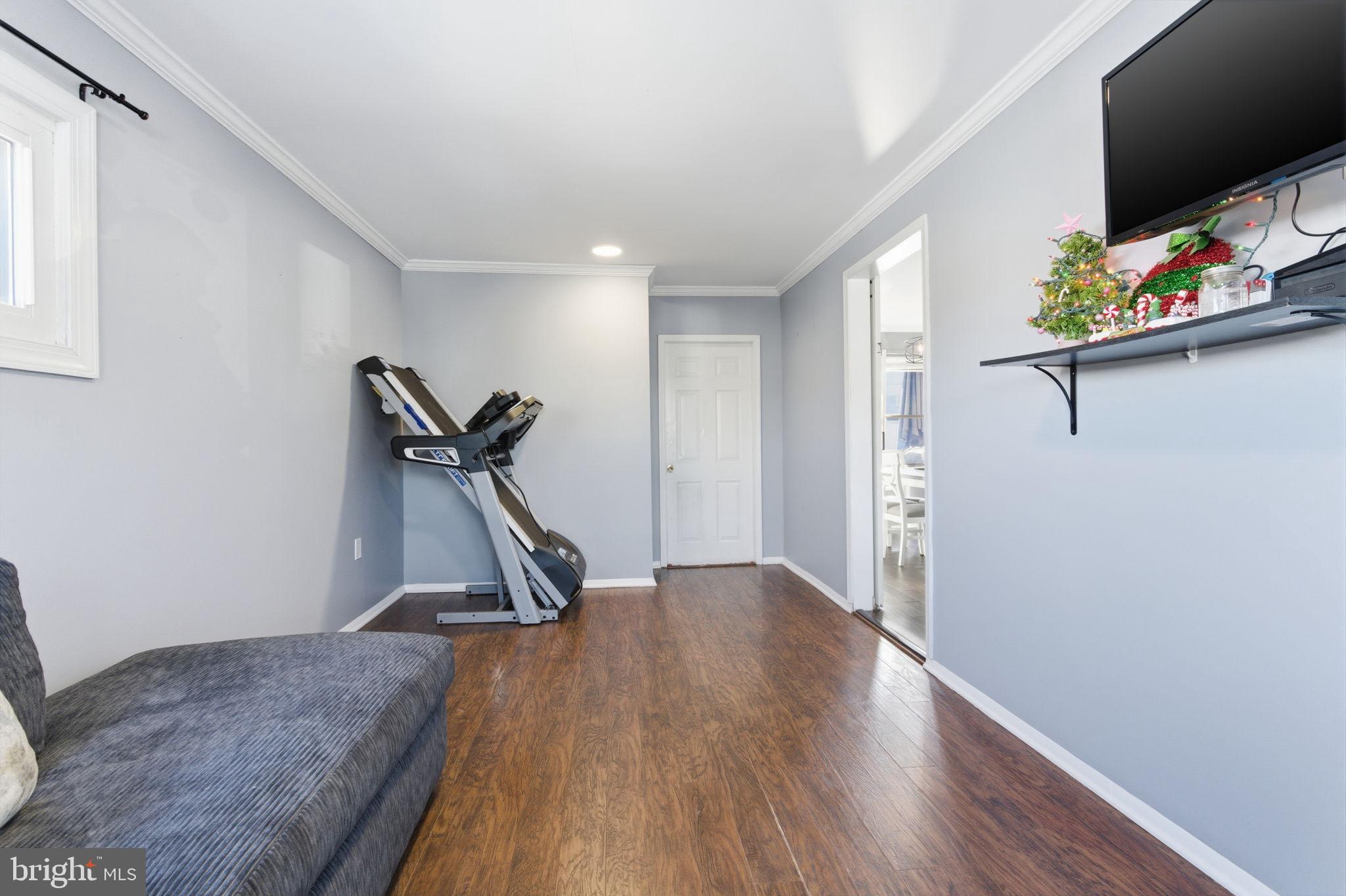 44 Cactus Road Levittown, PA 19057 - Photo 11 of 29 a view of a hallway with workspace