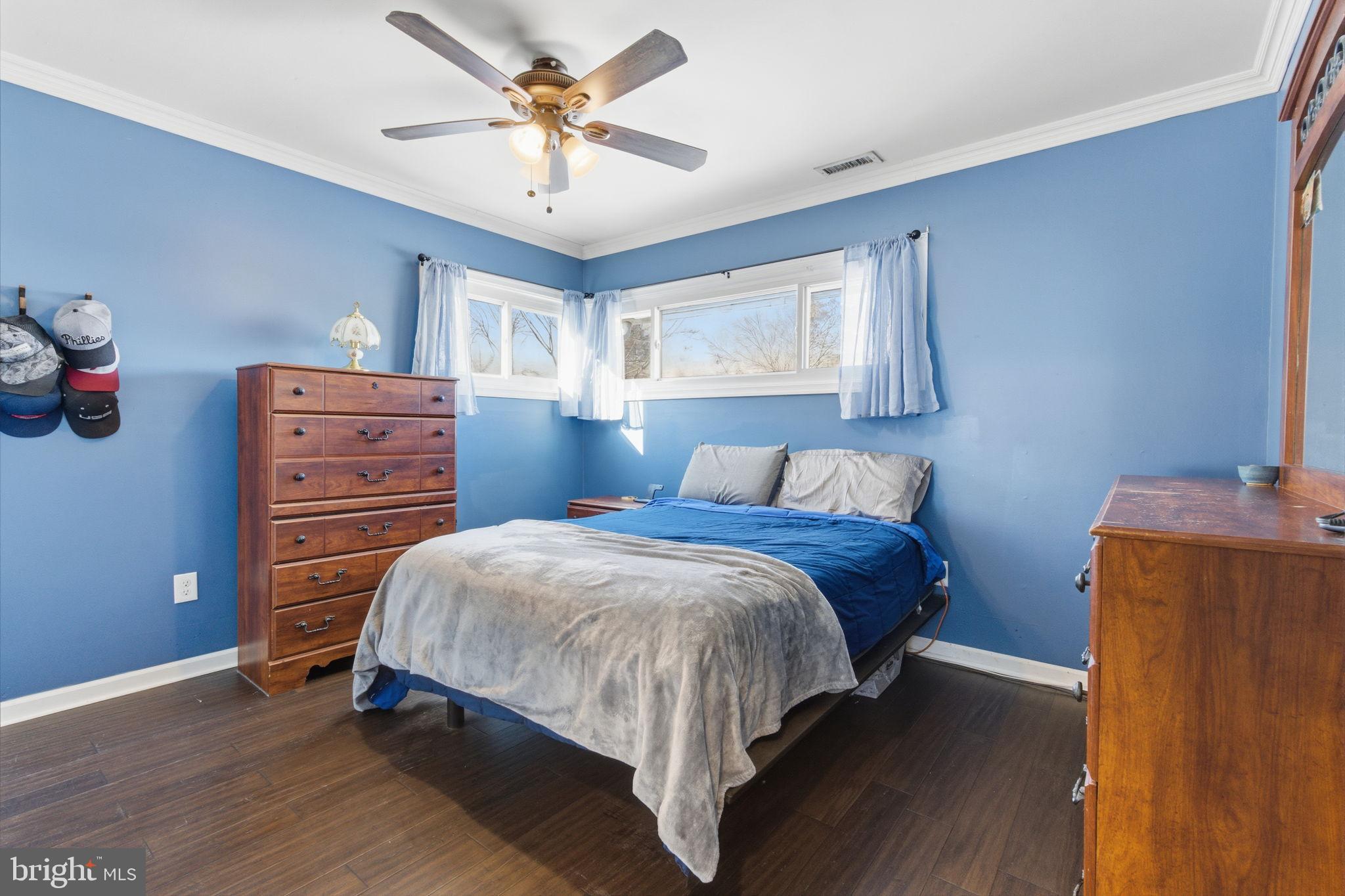 44 Cactus Road Levittown, PA 19057 - Photo 14 of 29 a bedroom with a bed and a dresser