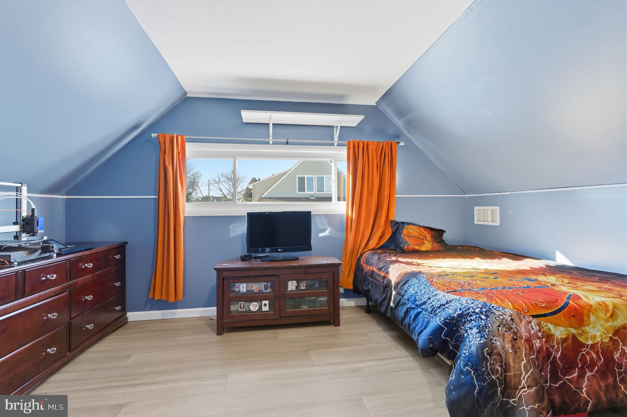 44 Cactus Road Levittown, PA 19057 - Photo 18 of 29 a bedroom with a bed and a dresser