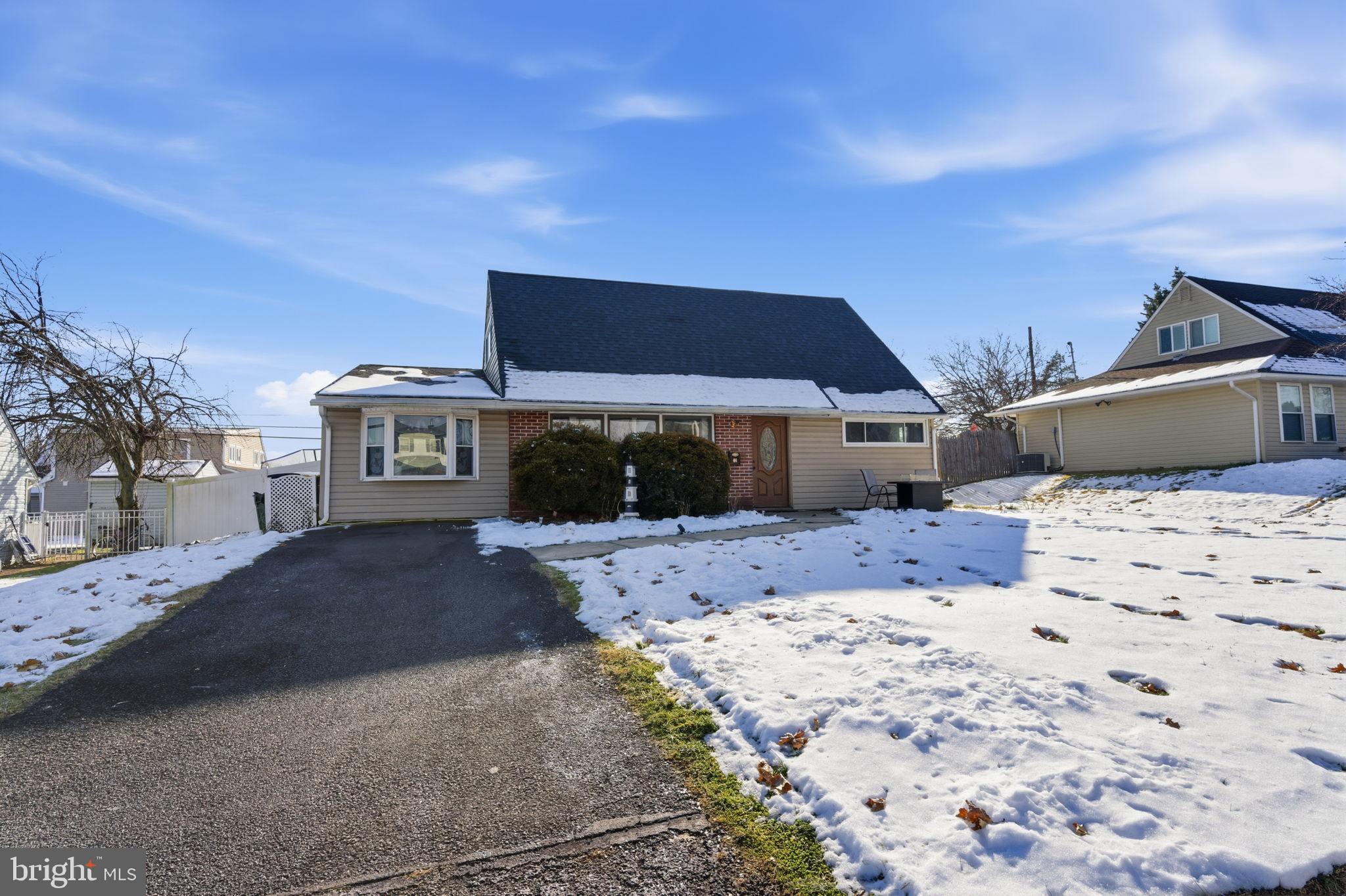 44 Cactus Road Levittown, PA 19057 - Photo 21 of 29 a front view of a house with a yard