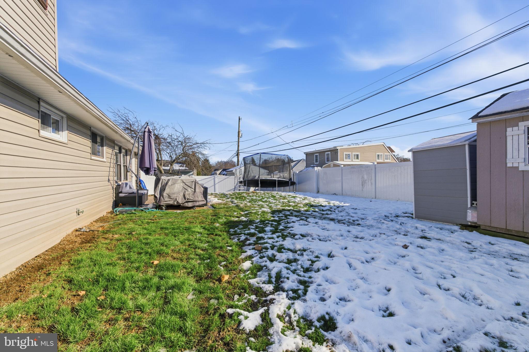 44 Cactus Road Levittown, PA 19057 - Photo 24 of 29 a backyard of a house with lots of green space