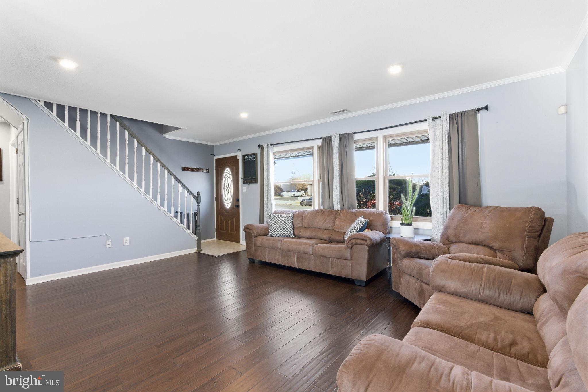 44 Cactus Road Levittown, PA 19057 - Photo 4 of 29 a living room with furniture and a large window