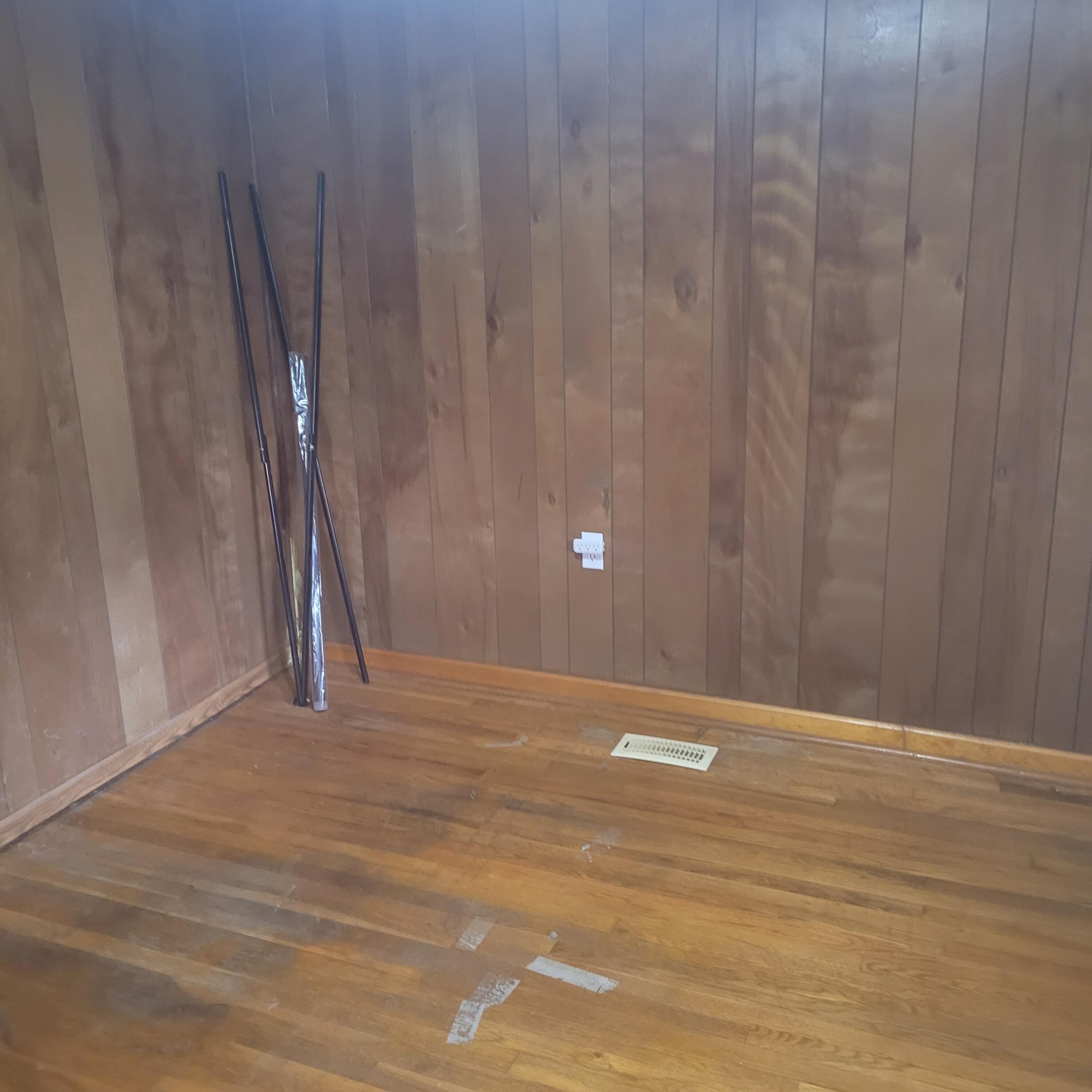 876 Dillon Street Pulaski, VA 24301 - Photo 11 of 18 a view of an empty room with wooden floor