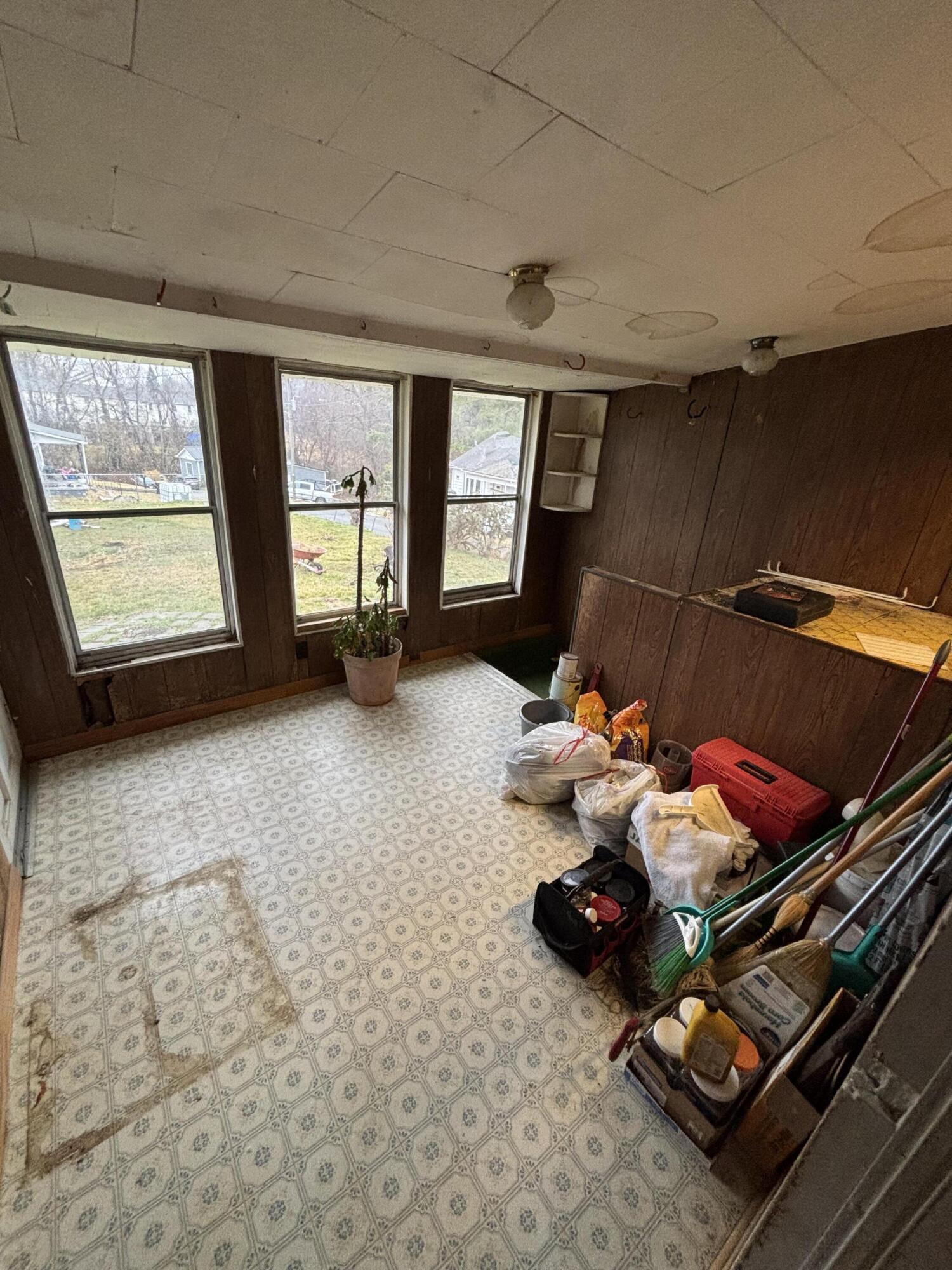 876 Dillon Street Pulaski, VA 24301 - Photo 11 of 20 a room with furniture and a large window