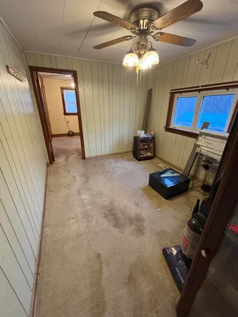 a view of a room with a flat screen tv