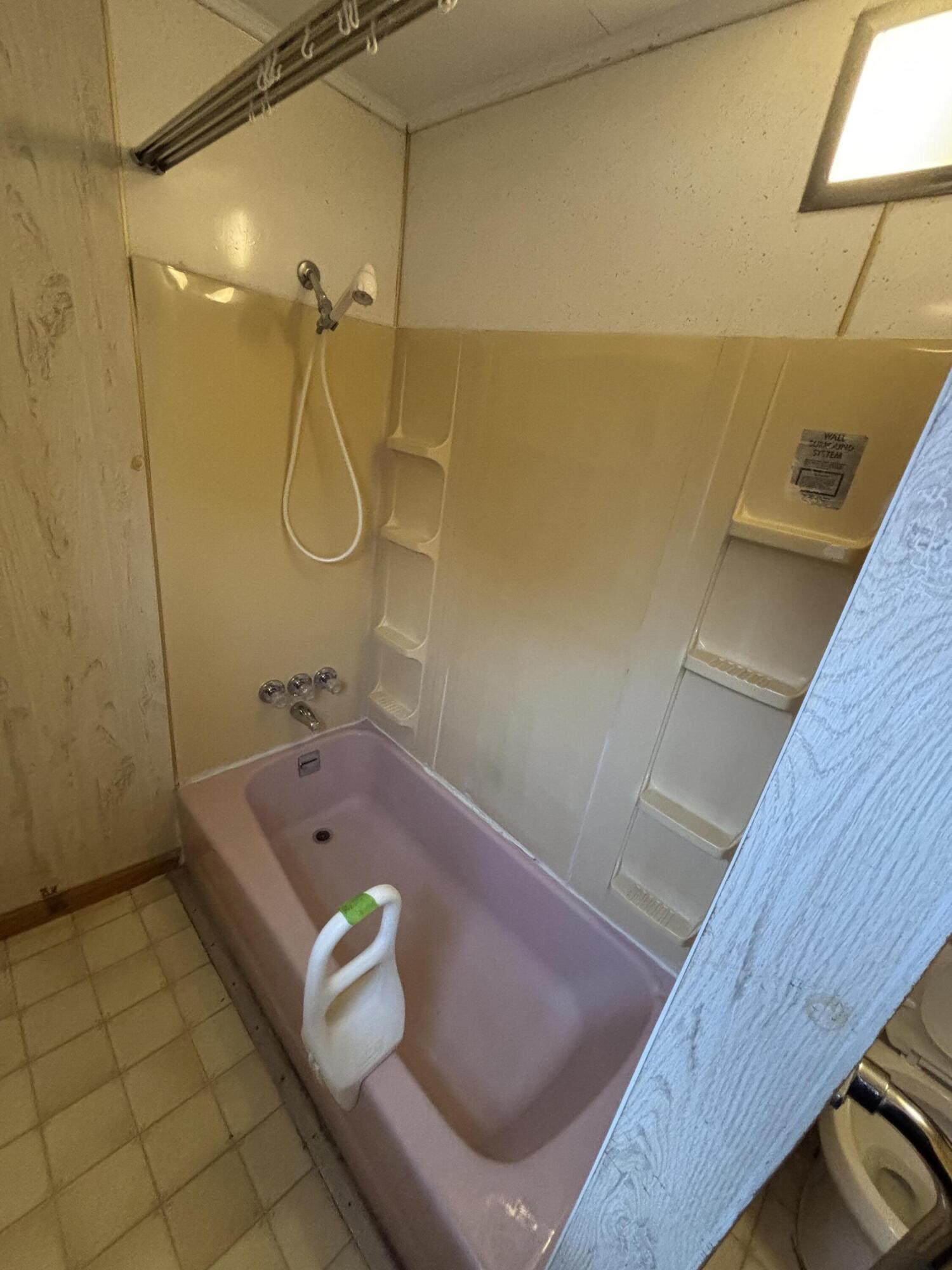 876 Dillon Street Pulaski, VA 24301 - Photo 14 of 18 a bathroom with a shower