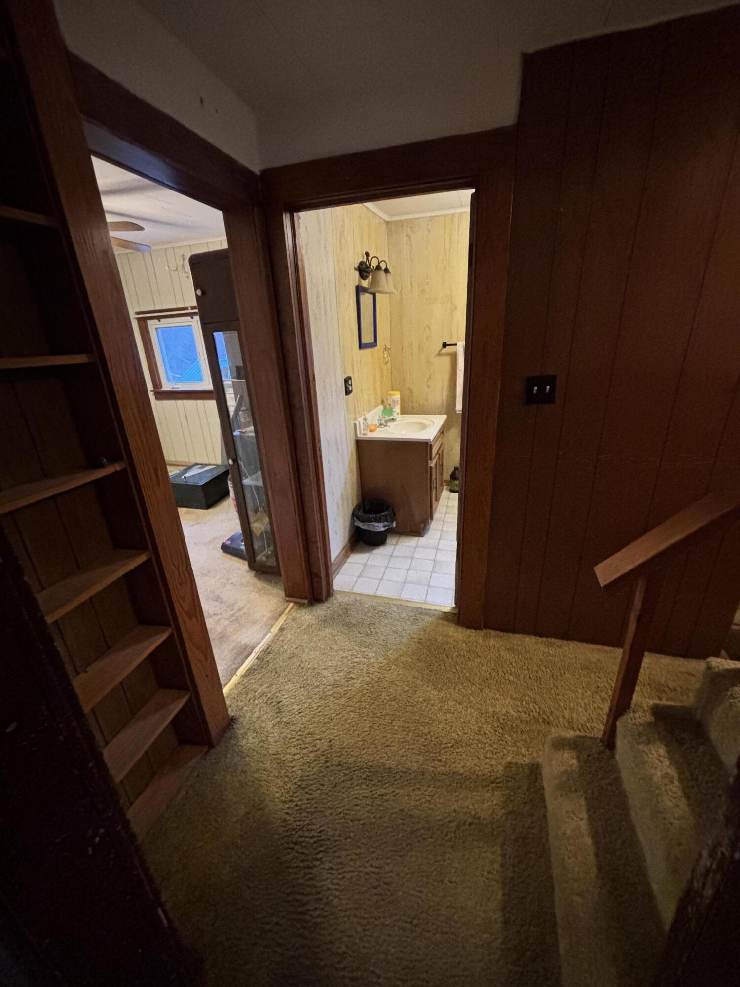 876 Dillon Street Pulaski, VA 24301 - Photo 17 of 20 a bedroom with a bed and a mirror