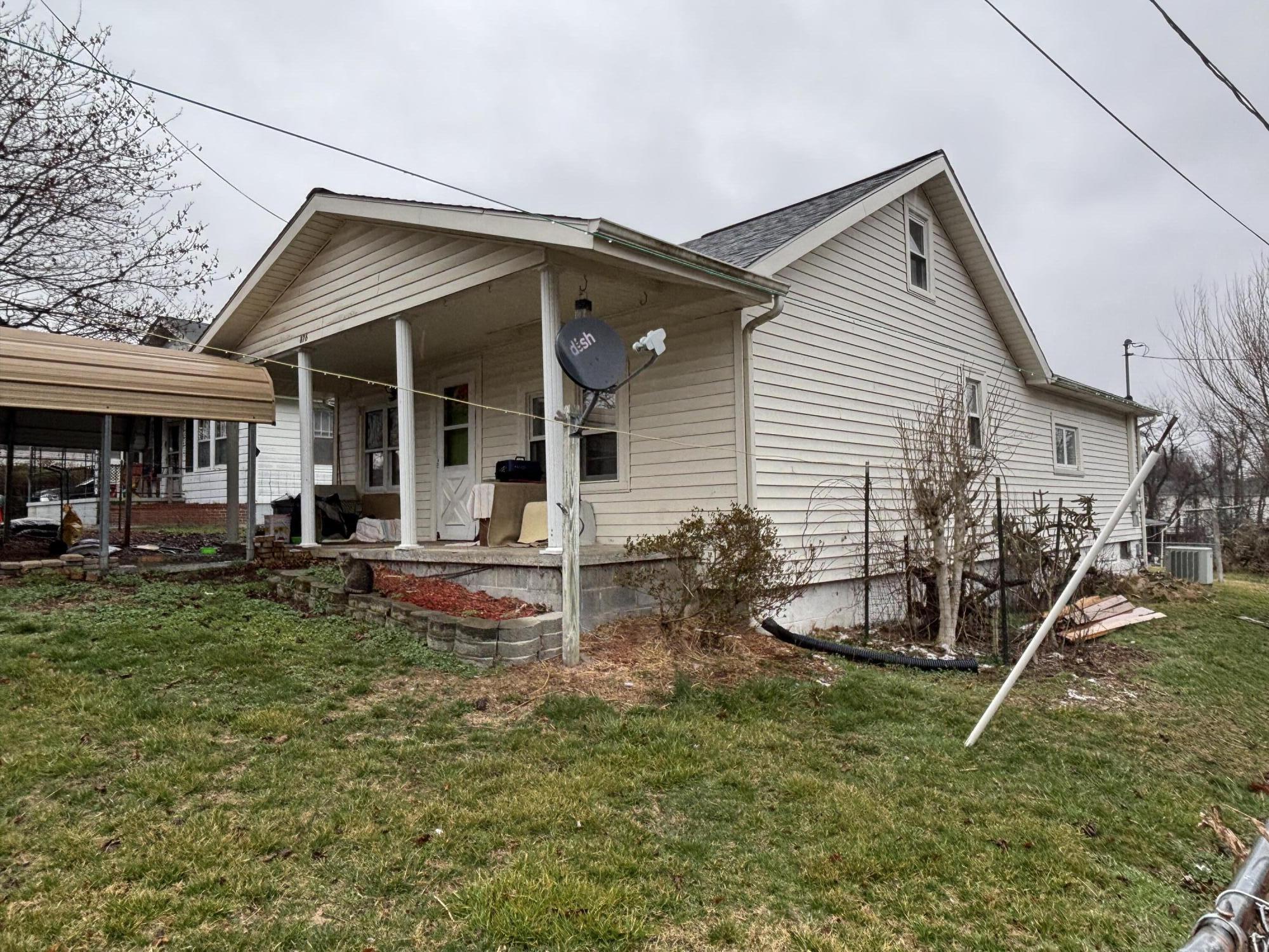 876 Dillon Street Pulaski, VA 24301 - Photo 2 of 18 a view of a house with backyard and sitting area