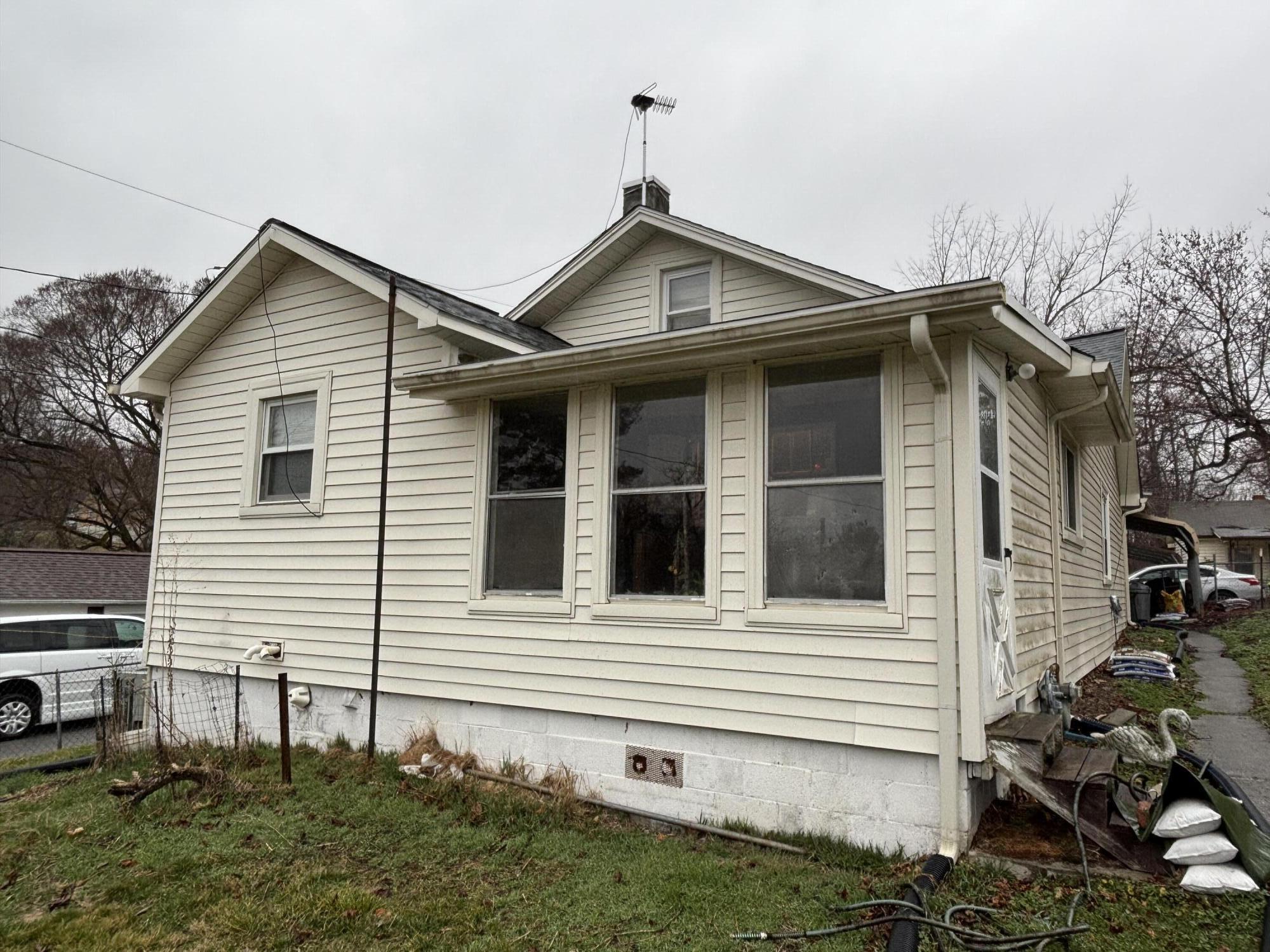 876 Dillon Street Pulaski, VA 24301 - Photo 6 of 20 a view of front of house with a yard