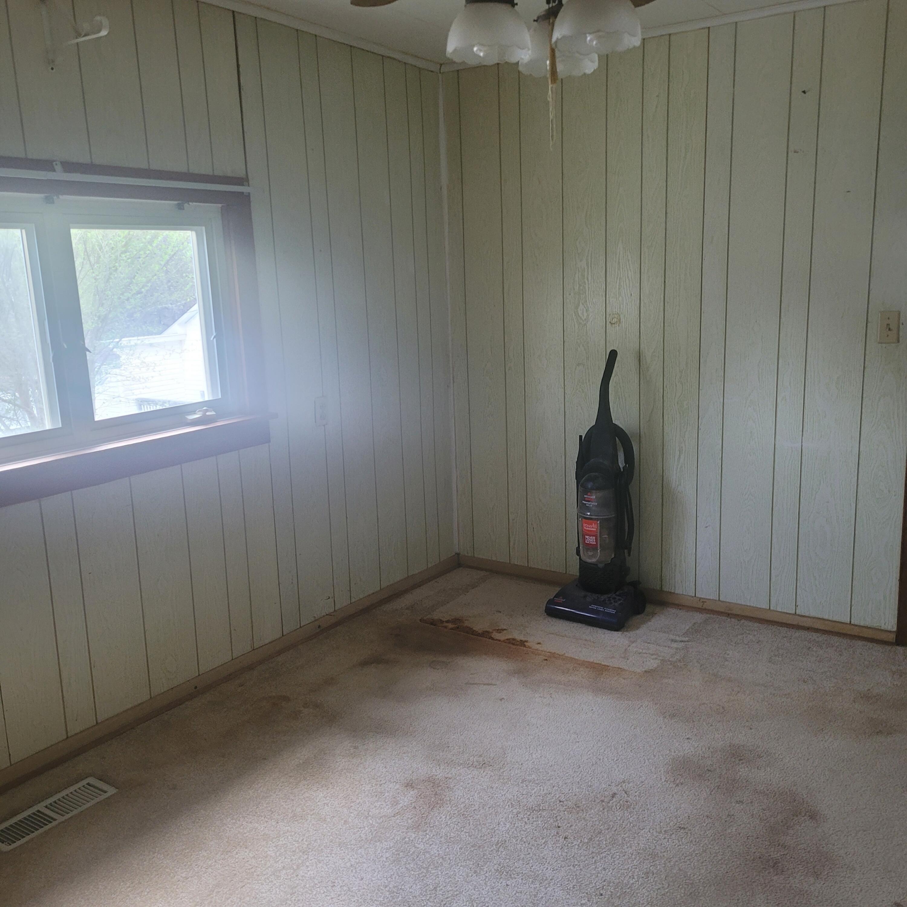 876 Dillon Street Pulaski, VA 24301 - Photo 10 of 18 a view of an empty room with a window