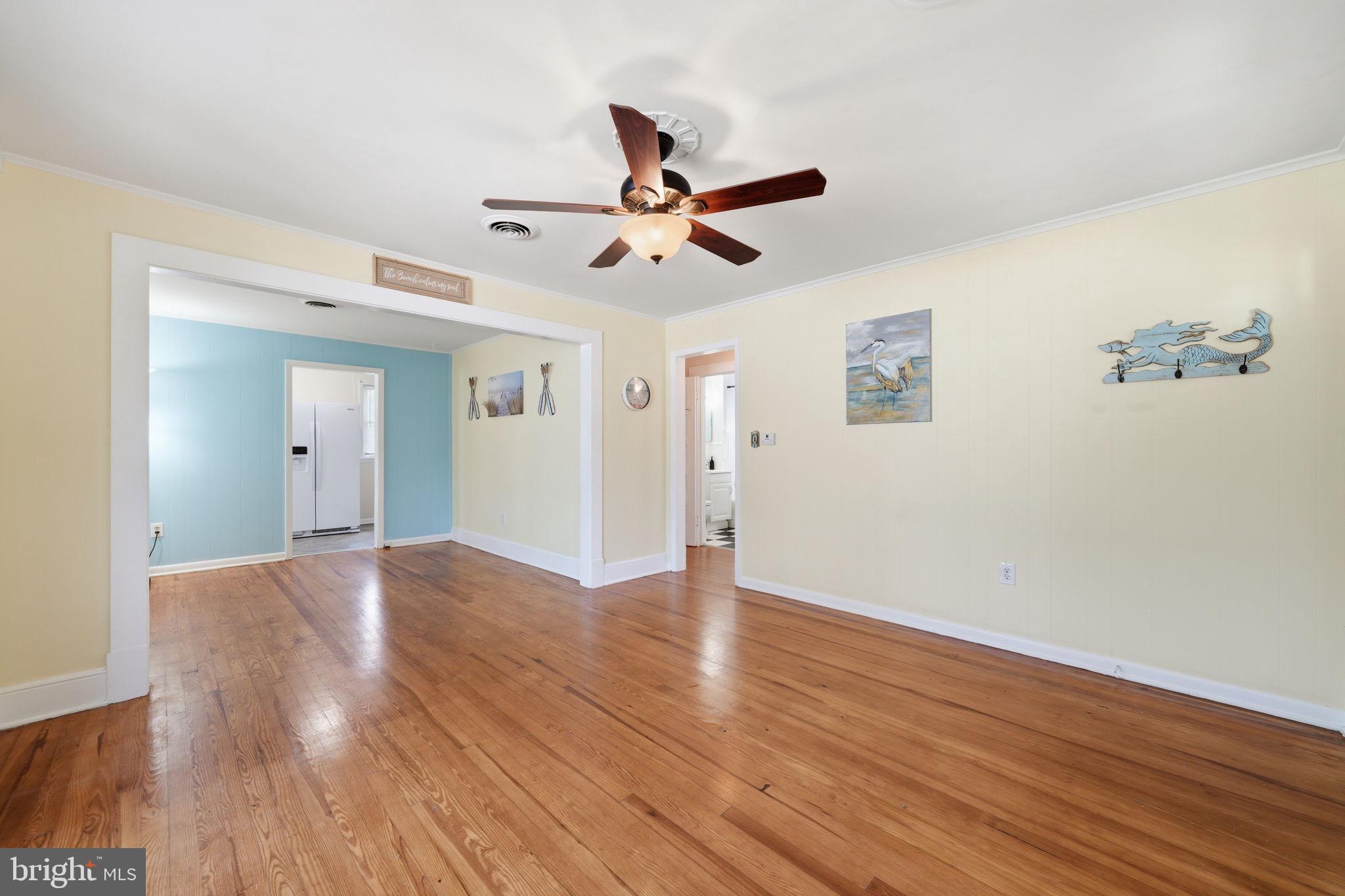 312 Vernon Street Colonial Beach, VA 22443 - Photo 17 of 45 wooden floor in an empty room