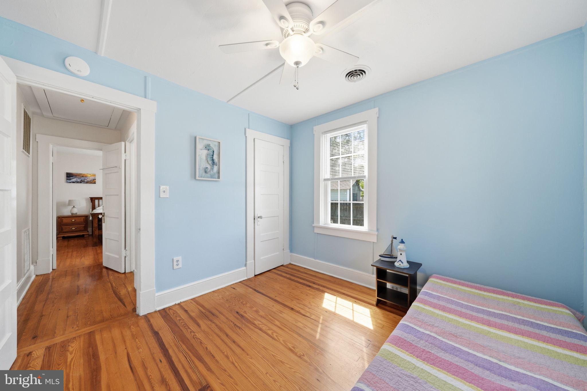312 Vernon Street Colonial Beach, VA 22443 - Photo 25 of 45 a bedroom with bed and window