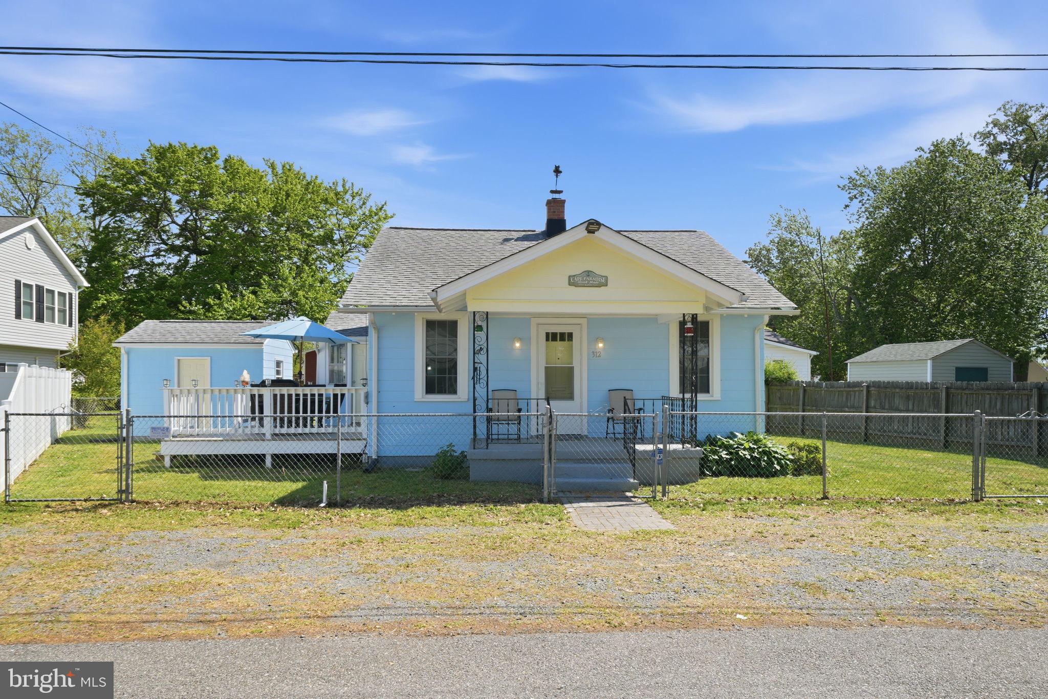 312 Vernon Street Colonial Beach, VA 22443 - Photo 3 of 45 front view of a house with a yard