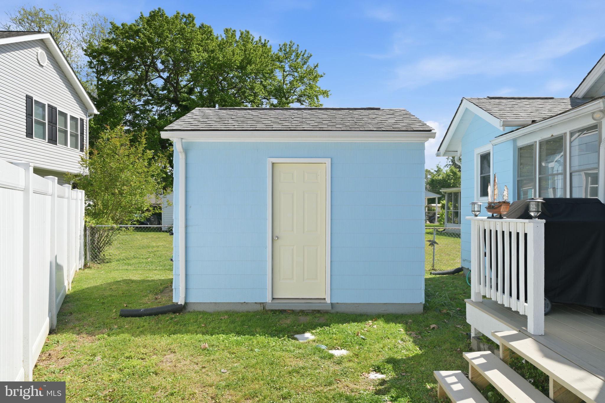 312 Vernon Street Colonial Beach, VA 22443 - Photo 7 of 45 a front view of a house with garden