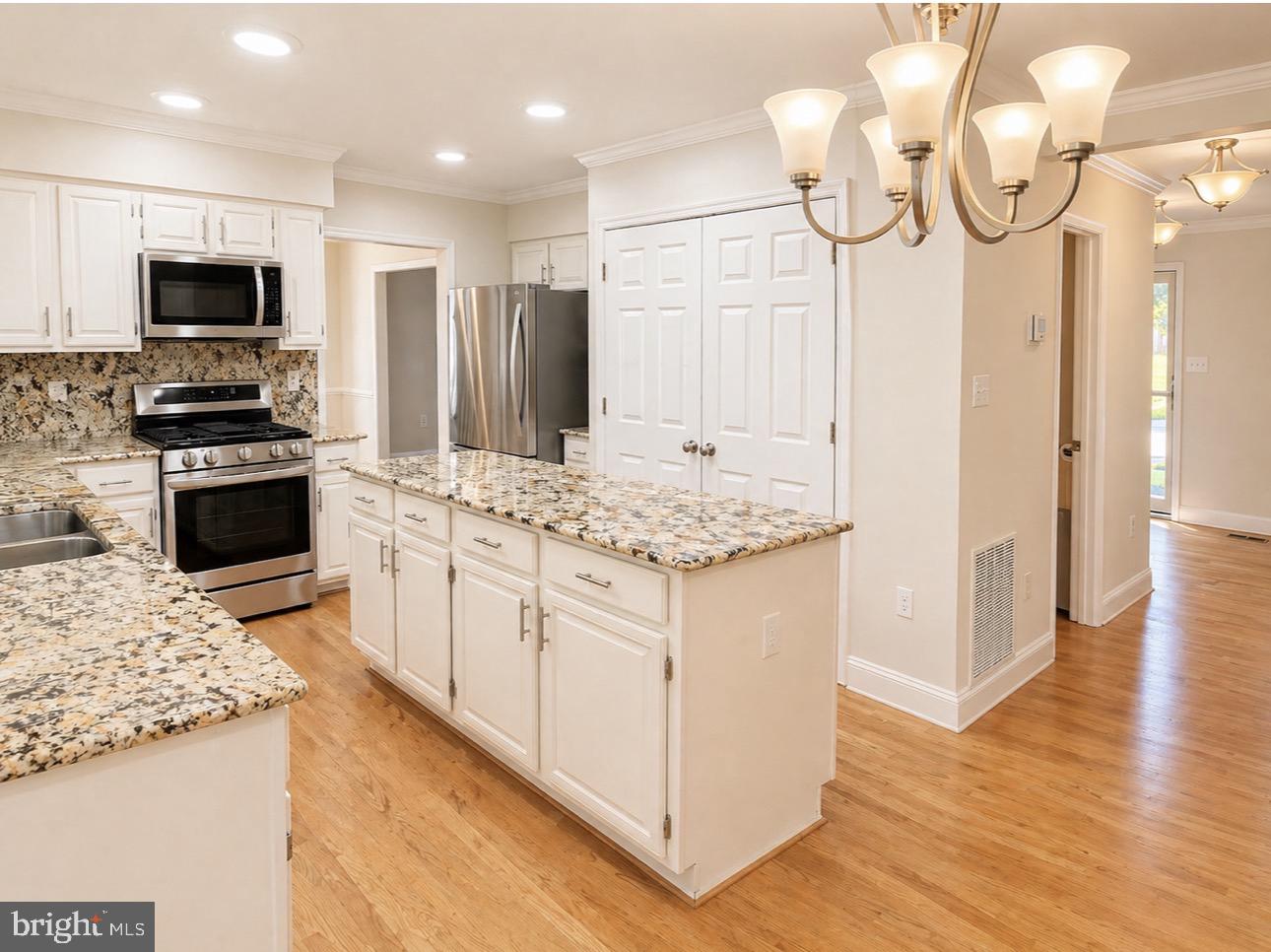 7917 Donegal Lane Springfield, VA 22153 - Photo 11 of 55 Modern kitchen with elegant finishes.