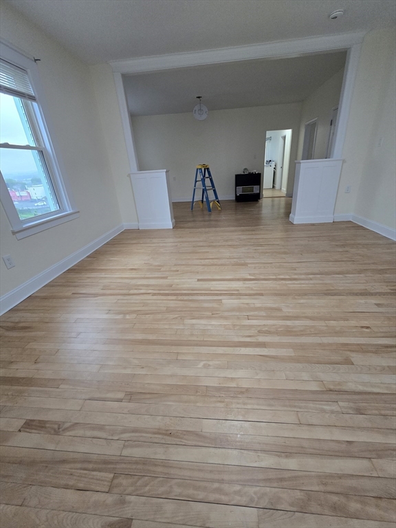 38 Fox Street, Unit 2 Worcester, MA 01604 - Photo 15 of 21 a room with a wooden floor