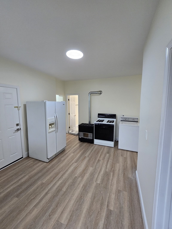 38 Fox Street, Unit 2 Worcester, MA 01604 - Photo 5 of 21 a view of a kitchen with wooden floor