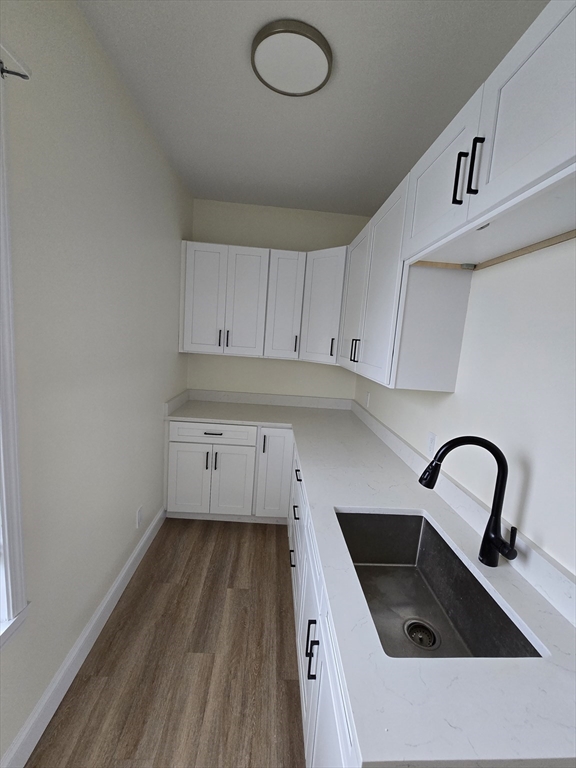 38 Fox Street, Unit 2 Worcester, MA 01604 - Photo 8 of 21 a kitchen with a sink a stove and cabinets