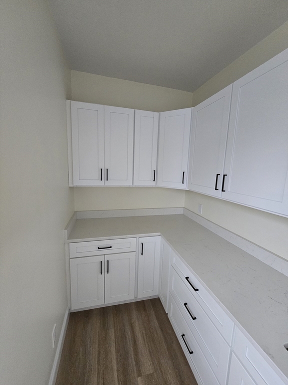 38 Fox Street, Unit 2 Worcester, MA 01604 - Photo 10 of 21 a kitchen with white cabinets a sink and dishwasher