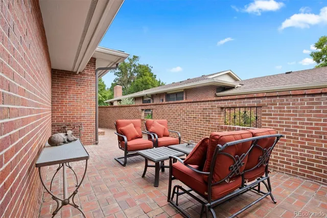 a patio with outdoor seating
