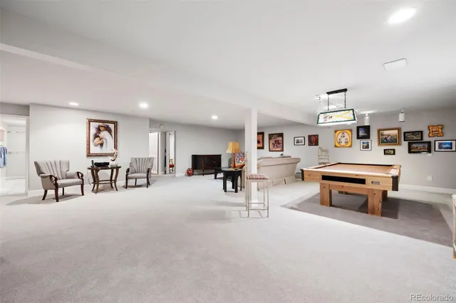 a living room with furniture and a table