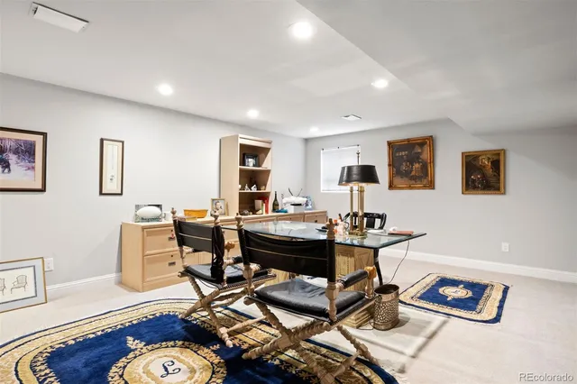 a workspace with furniture and wooden floor