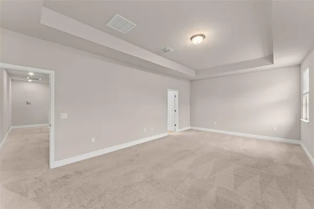 a view of an empty room with window
