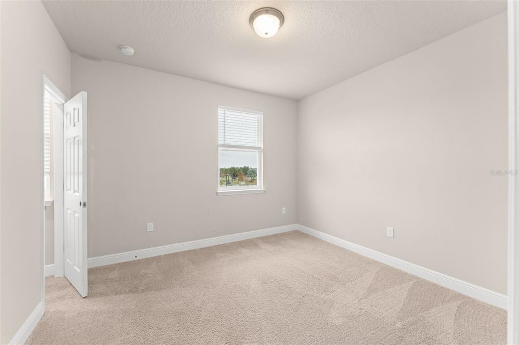2224 Shadowland Loop Winter Park, FL 32792 - Photo 36 of 42 an empty room with a window