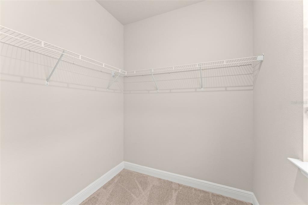 2224 Shadowland Loop Winter Park, FL 32792 - Photo 38 of 42 a view of a room with racks on the wall