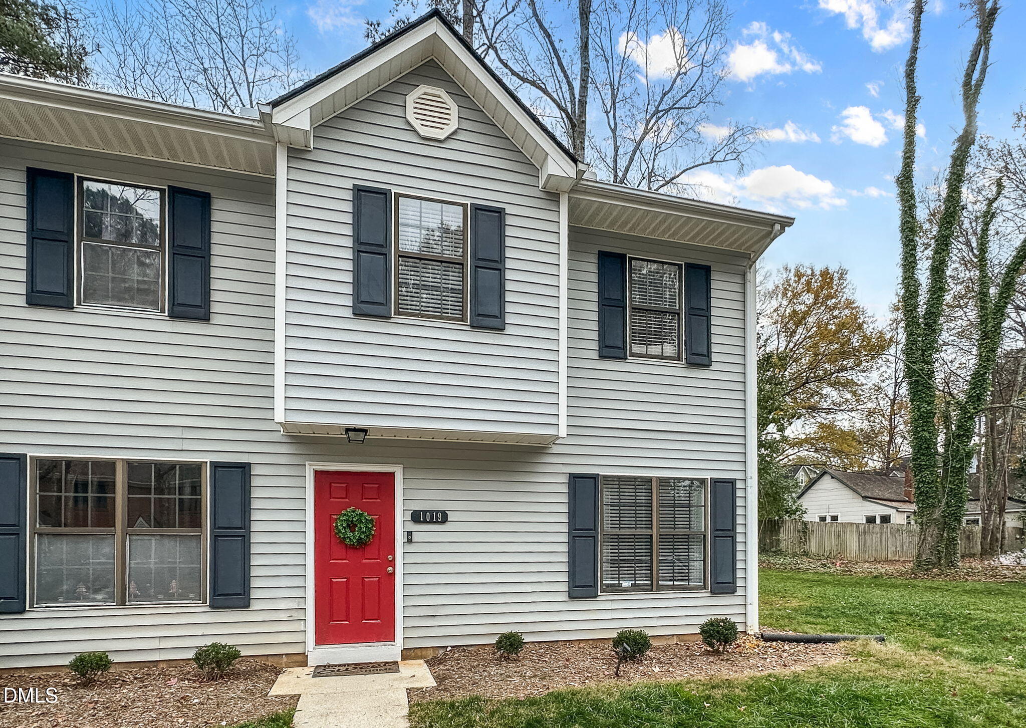 1019 Parkthrough Street Cary, NC 27511 - Photo 1 of 23 a front view of a house with a yard