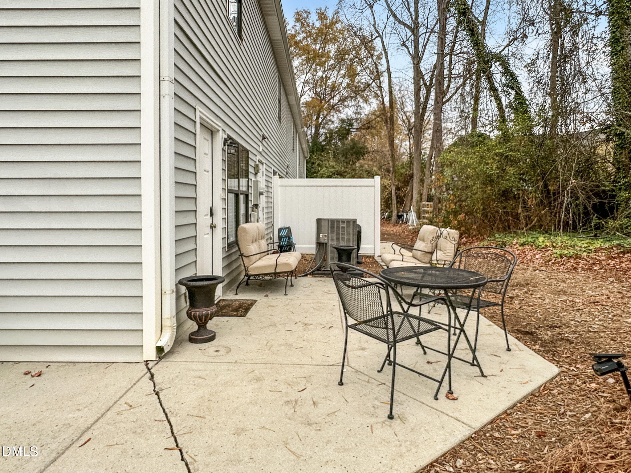 1019 Parkthrough Street Cary, NC 27511 - Photo 22 of 23 a view of backyard with seating space and trees