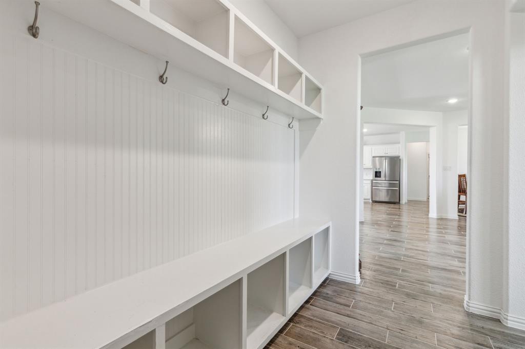 2410 Black Jack Oak Road Terrell, TX 75161 - Photo 26 of 31 Mudroom featuring wood finished floors and baseboards