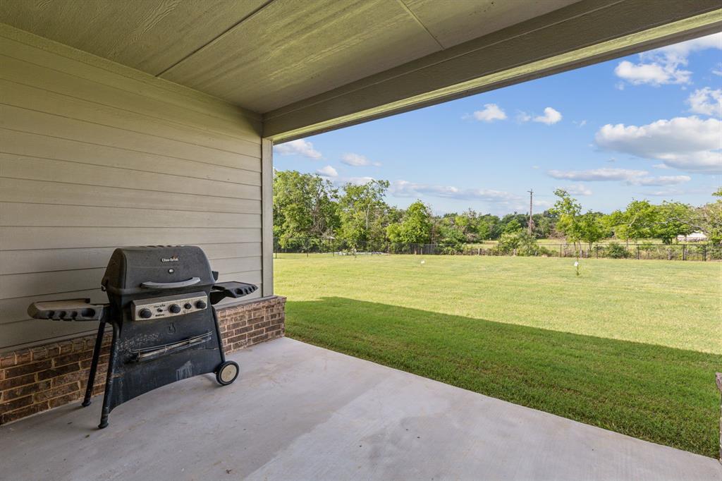 2410 Black Jack Oak Road Terrell, TX 75161 - Photo 7 of 31 View of patio featuring a grill