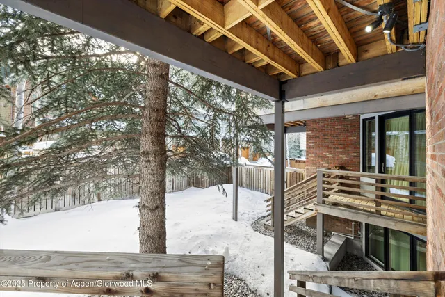 a view of a porch with a backyard