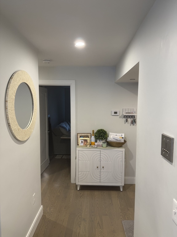 7 Saco Street, Unit 5 Boston, MA 02122 - Photo 8 of 15 a view of a room that has a washer and dryer