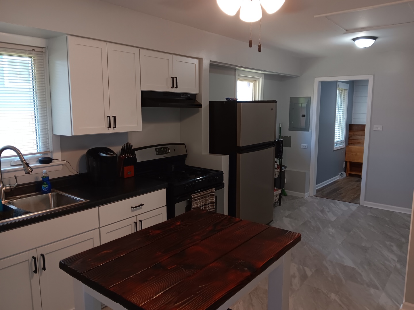 10600 Oak Avenue Chicago Ridge, IL 60415 - Photo 12 of 25 a kitchen with refrigerator and cabinets