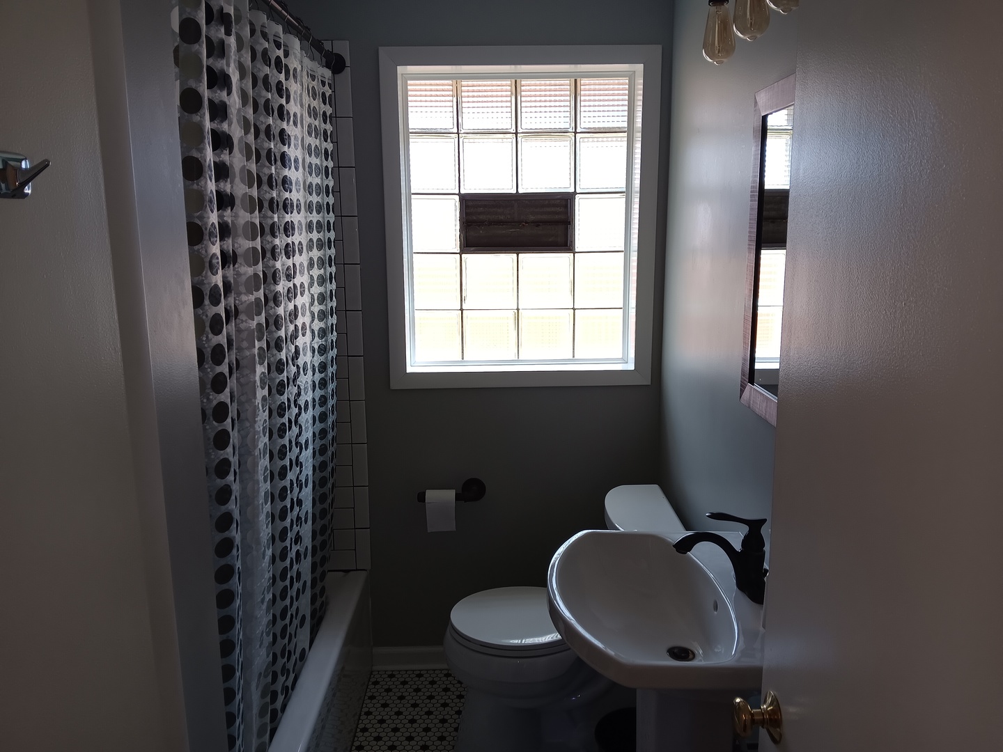 10600 Oak Avenue Chicago Ridge, IL 60415 - Photo 25 of 25 a bathroom with a toilet sink and window