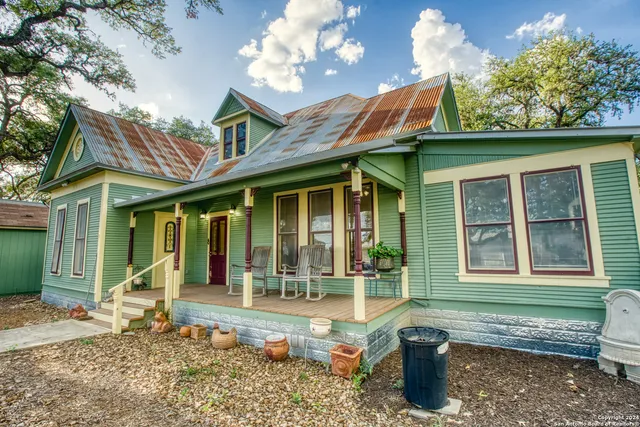 a front view of a house with a porch