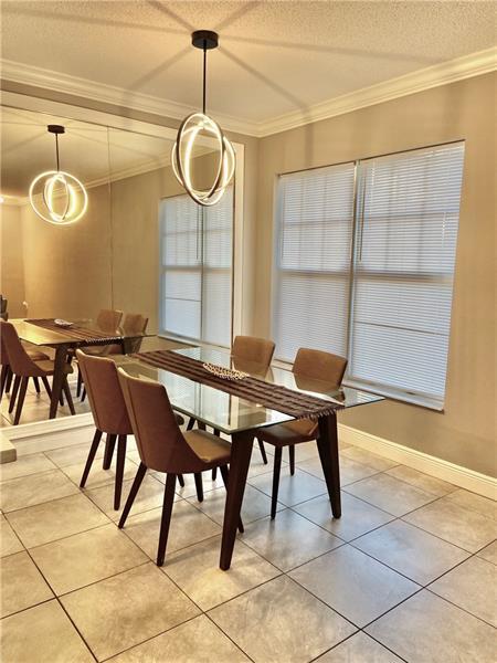6020 West Sample Road, Unit 105 Coral Springs, FL 33067 - Photo 14 of 50 6020 W Sample Rd # 105 Coral Springs Din