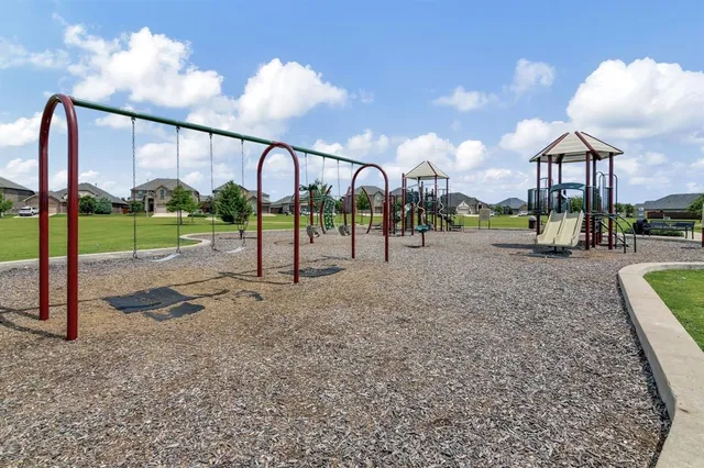 a view of a yard with a slide