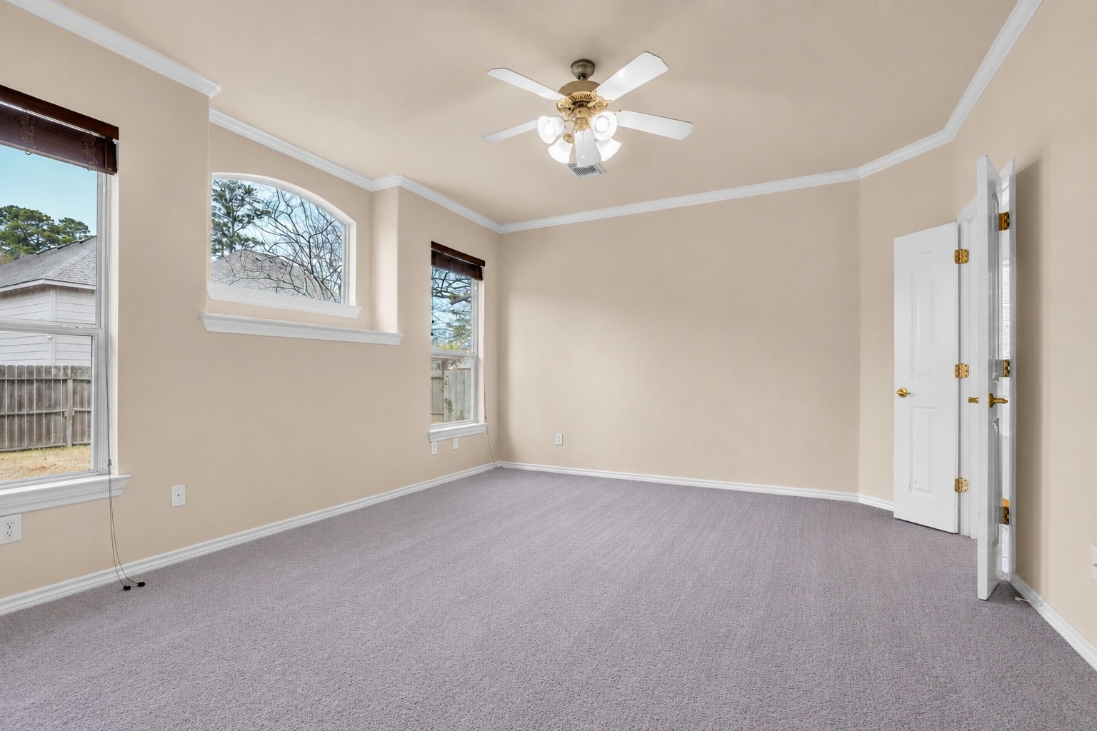 629 Spring Forest Drive Conroe, TX 77302 - Photo 8 of 39 Plenty of natural light in the primary bedroom!