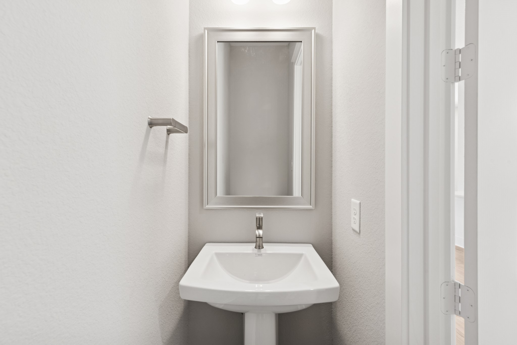 18623 Rumba Court Conroe, TX 77302 - Photo 36 of 48 a bathroom with a sink and a mirror