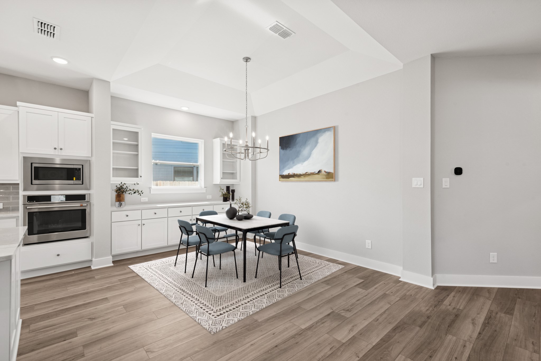 18623 Rumba Court Conroe, TX 77302 - Photo 4 of 48 a view of a dining room with furniture and chandelier
