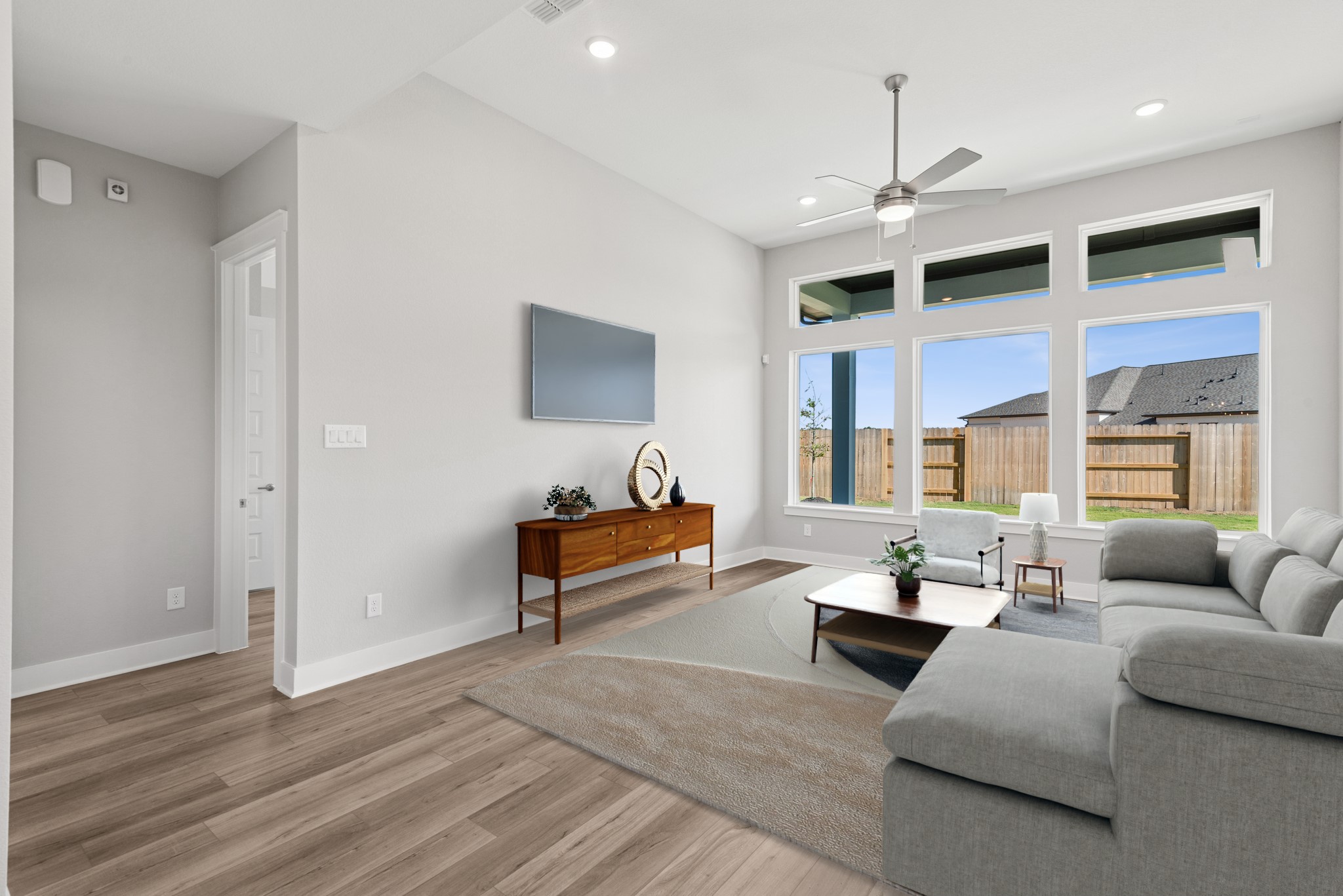 18623 Rumba Court Conroe, TX 77302 - Photo 5 of 48 a living room with furniture wooden floor and a flat screen tv