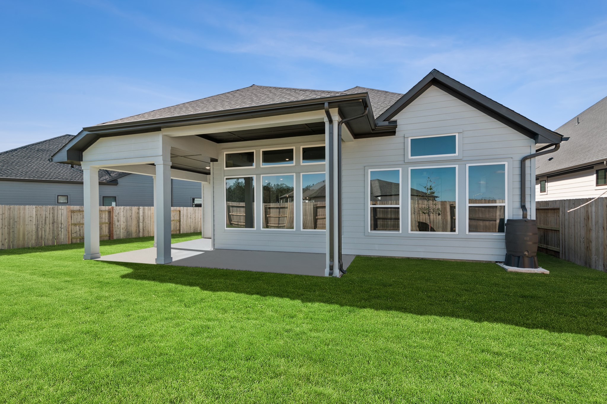18623 Rumba Court Conroe, TX 77302 - Photo 7 of 48 a view of front of house with a yard