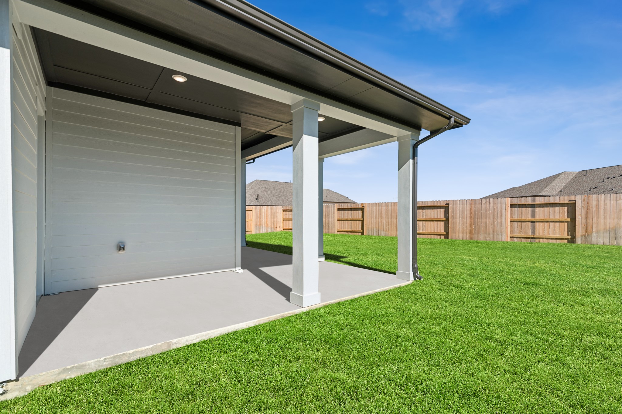 18623 Rumba Court Conroe, TX 77302 - Photo 10 of 48 a view of a backyard with a garden