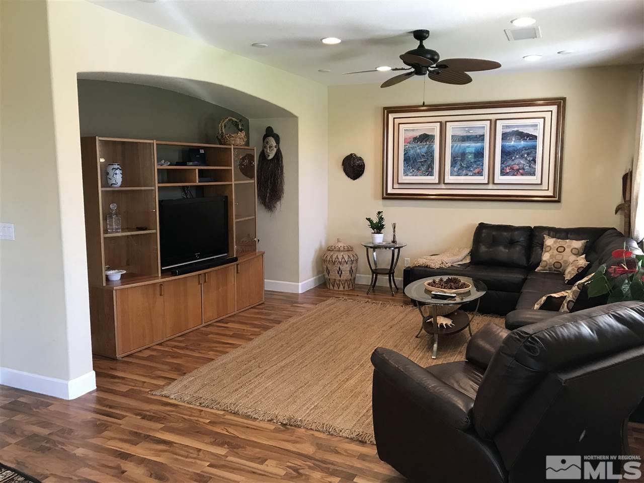 495 Terracina Way Reno, NV 89521 - Photo 6 of 25 a living room with furniture and a flat screen tv